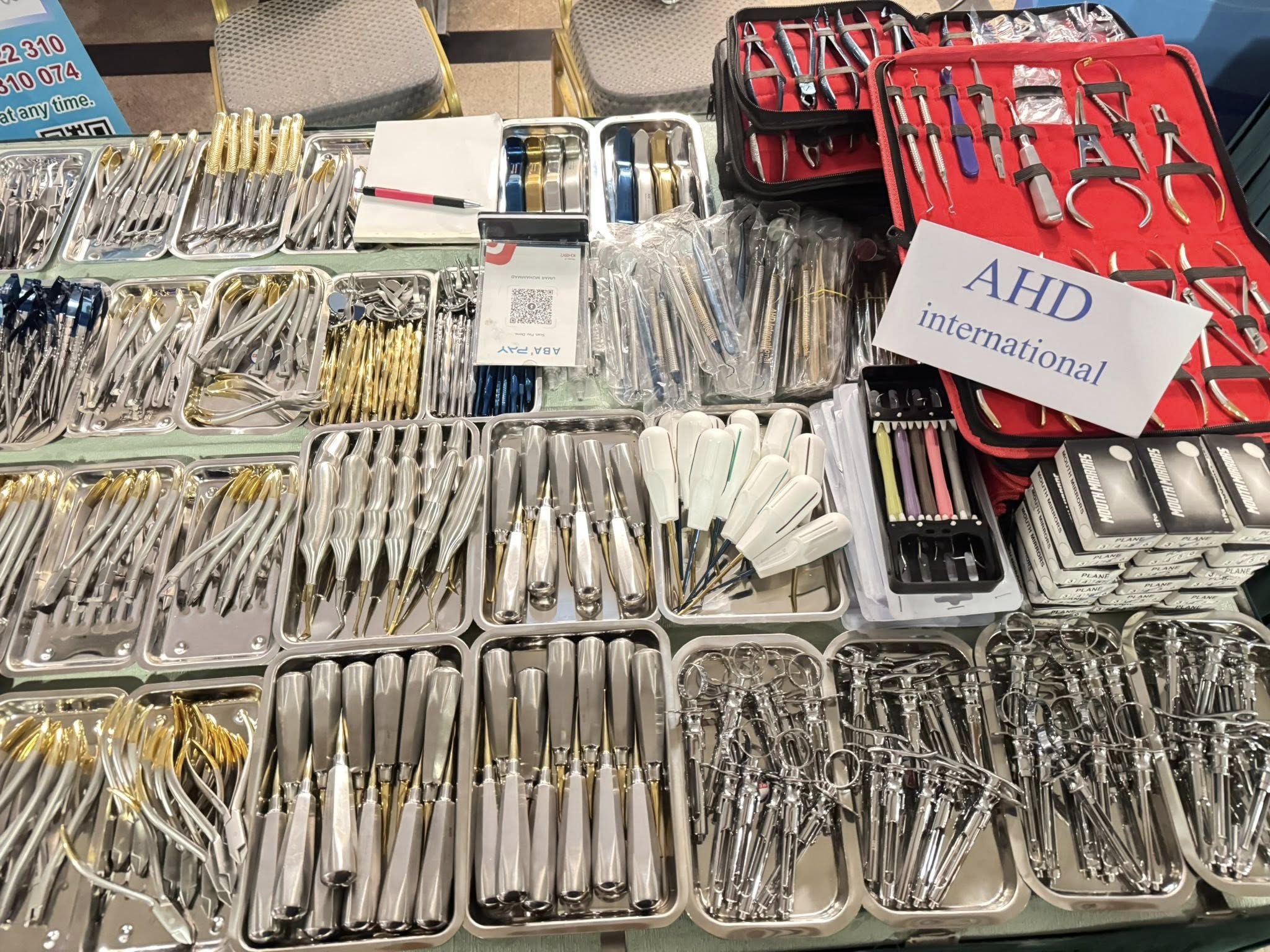 Full exhibition setup with AHD branding and sponsor logos